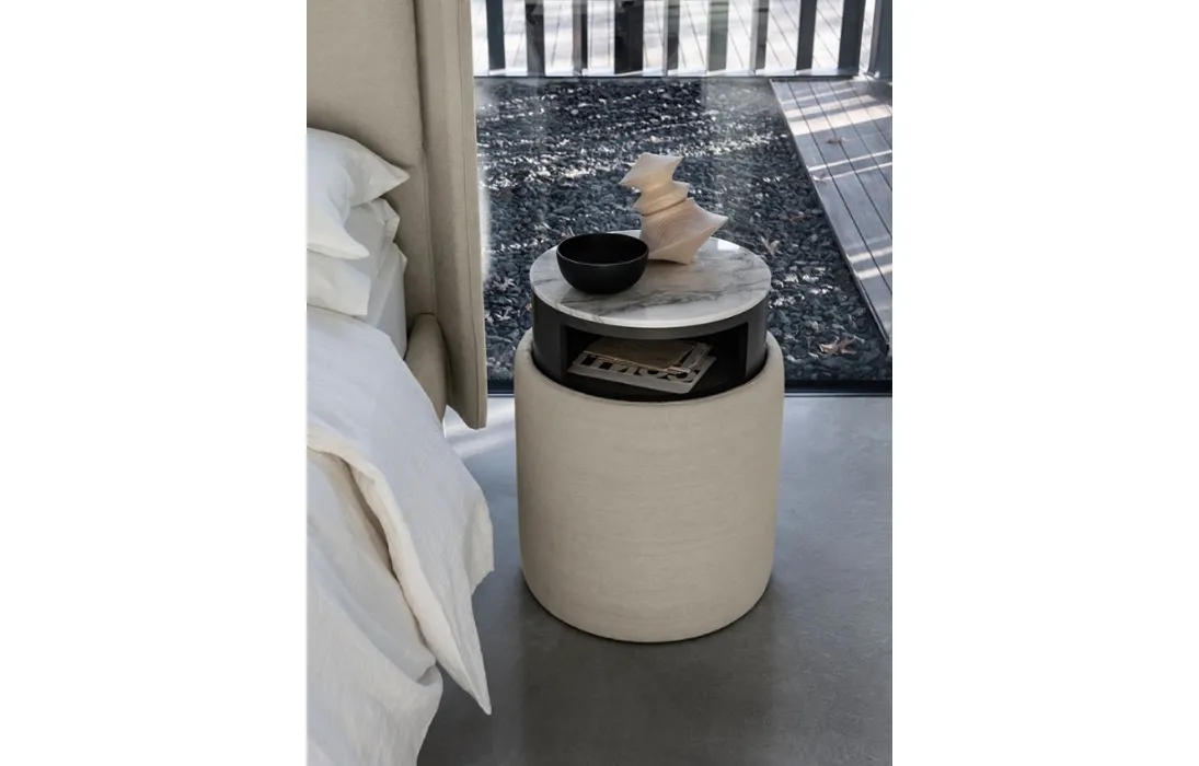 Pouf cilindrico multifunzione Ares in tessuto con cassetto push pull di Bolzan Letti